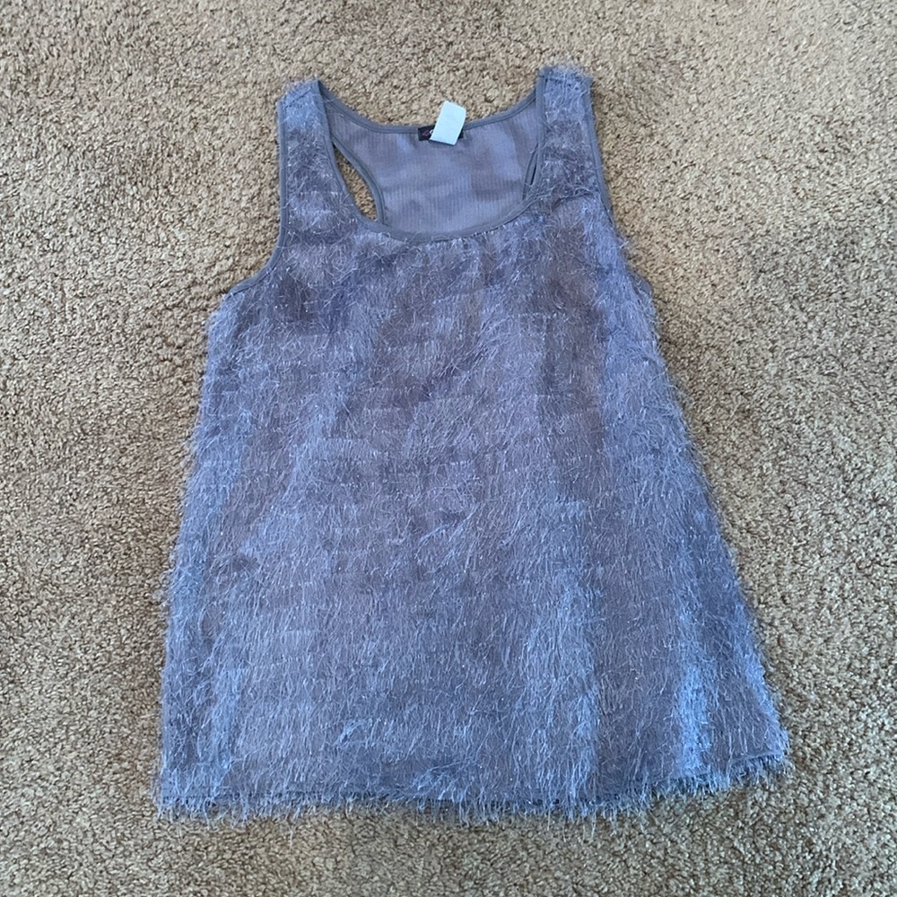 Woman’s sleeveless top